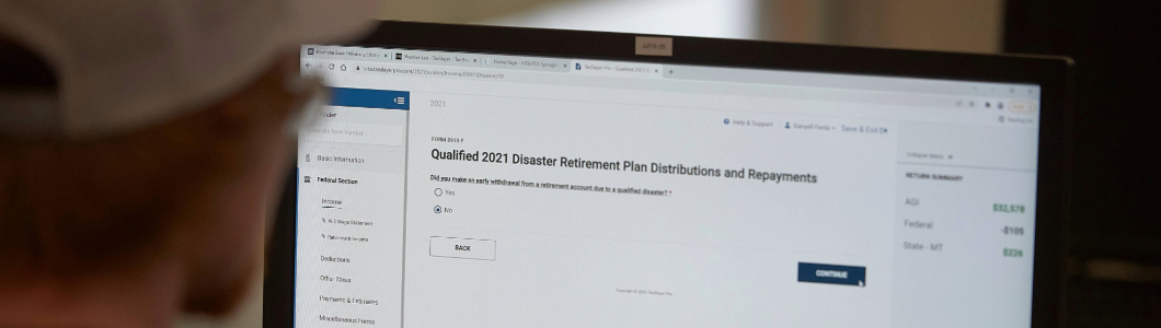 man looking at computer screen