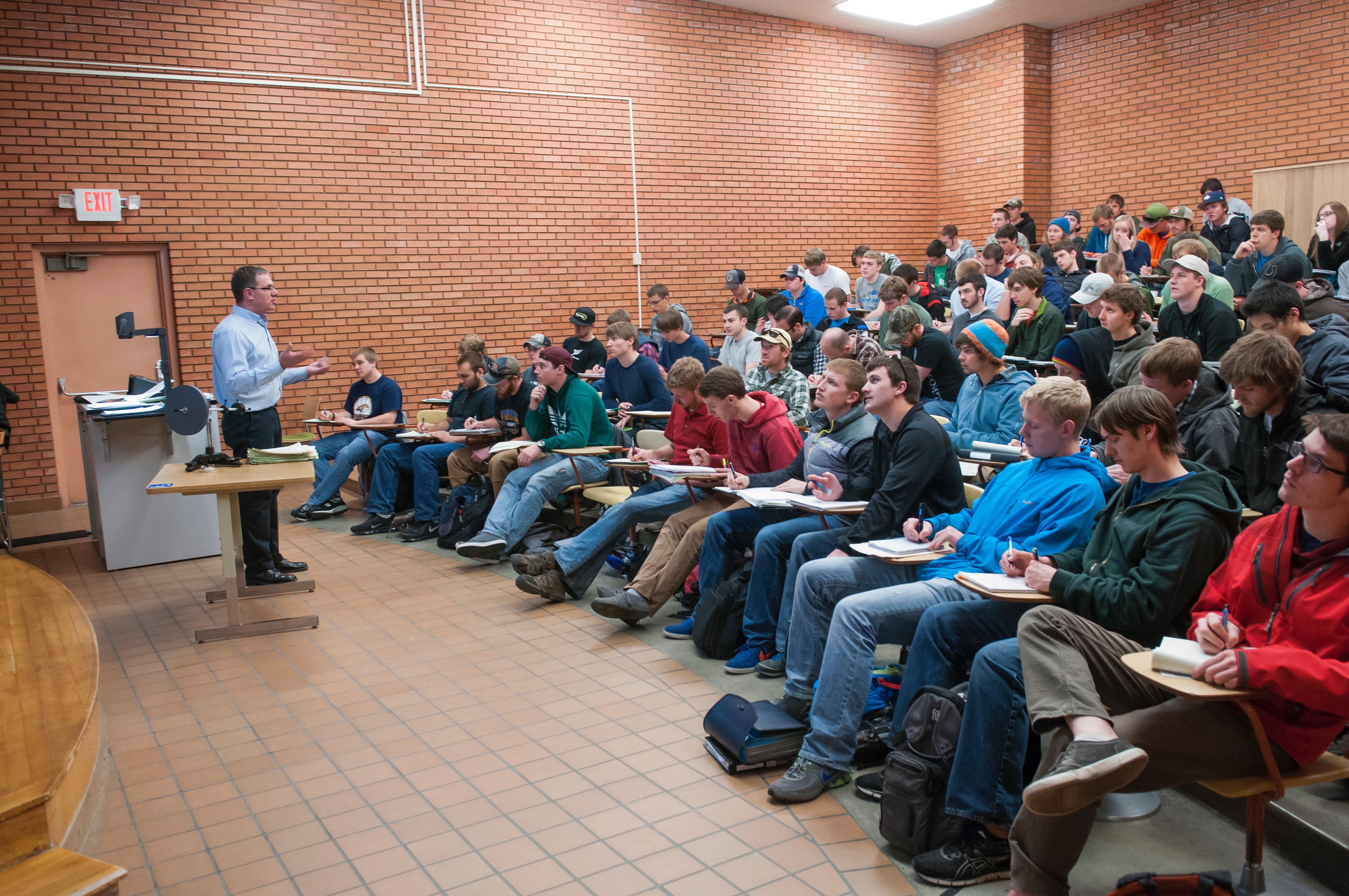 A picture of a professor giving a lecture