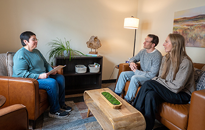 couple speaking with counselor