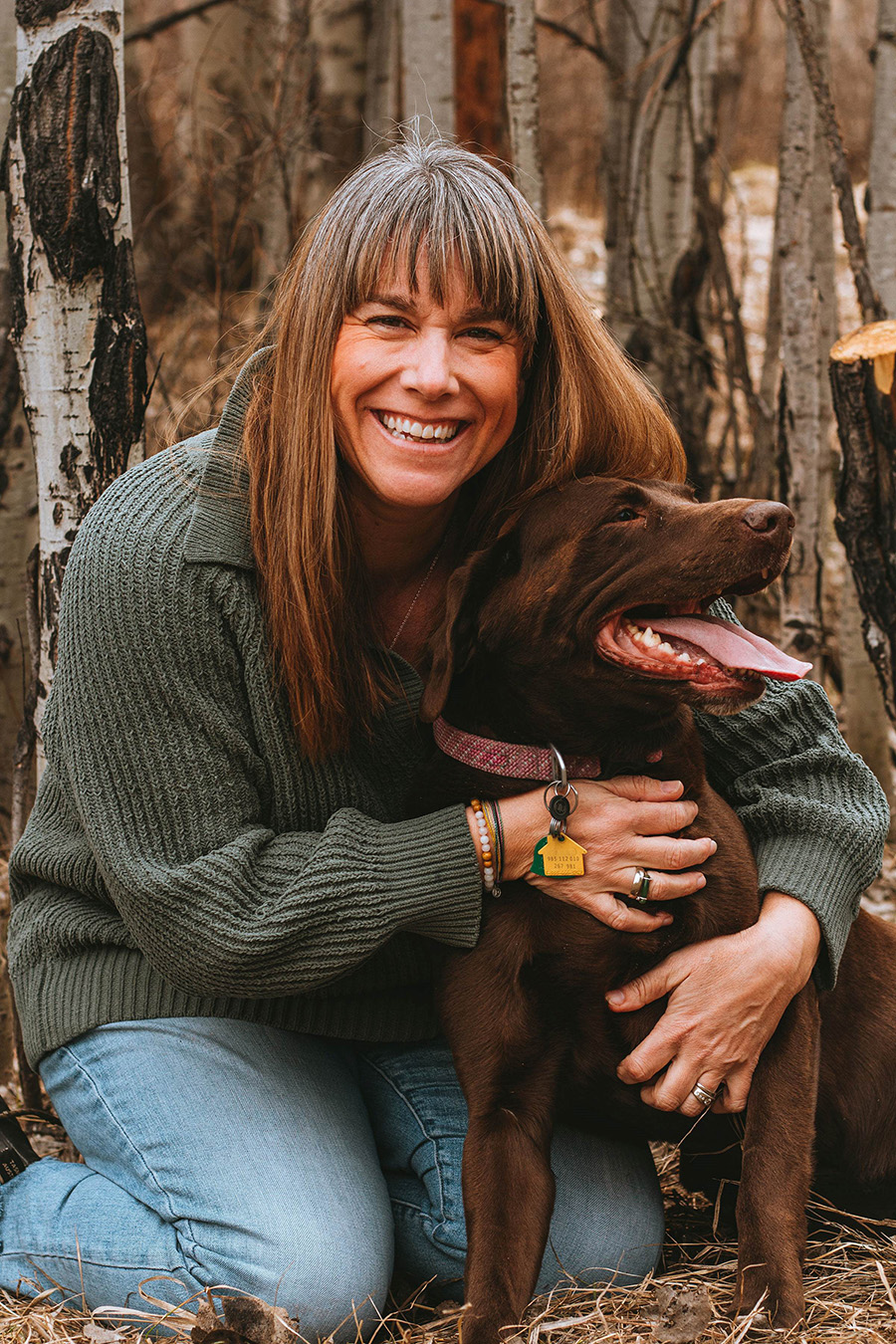 Photo of a woman and her dog.