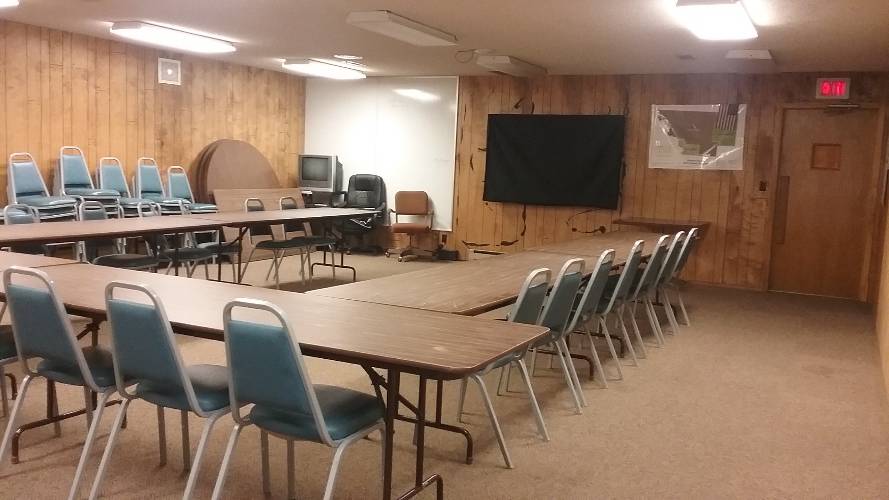 Conference room with tables and chairs