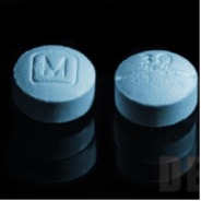 A lab image of two light blue round pills
