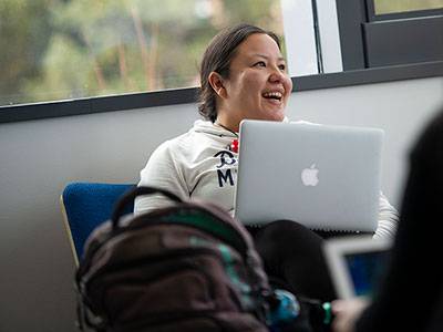 Young woman with a laptop computer