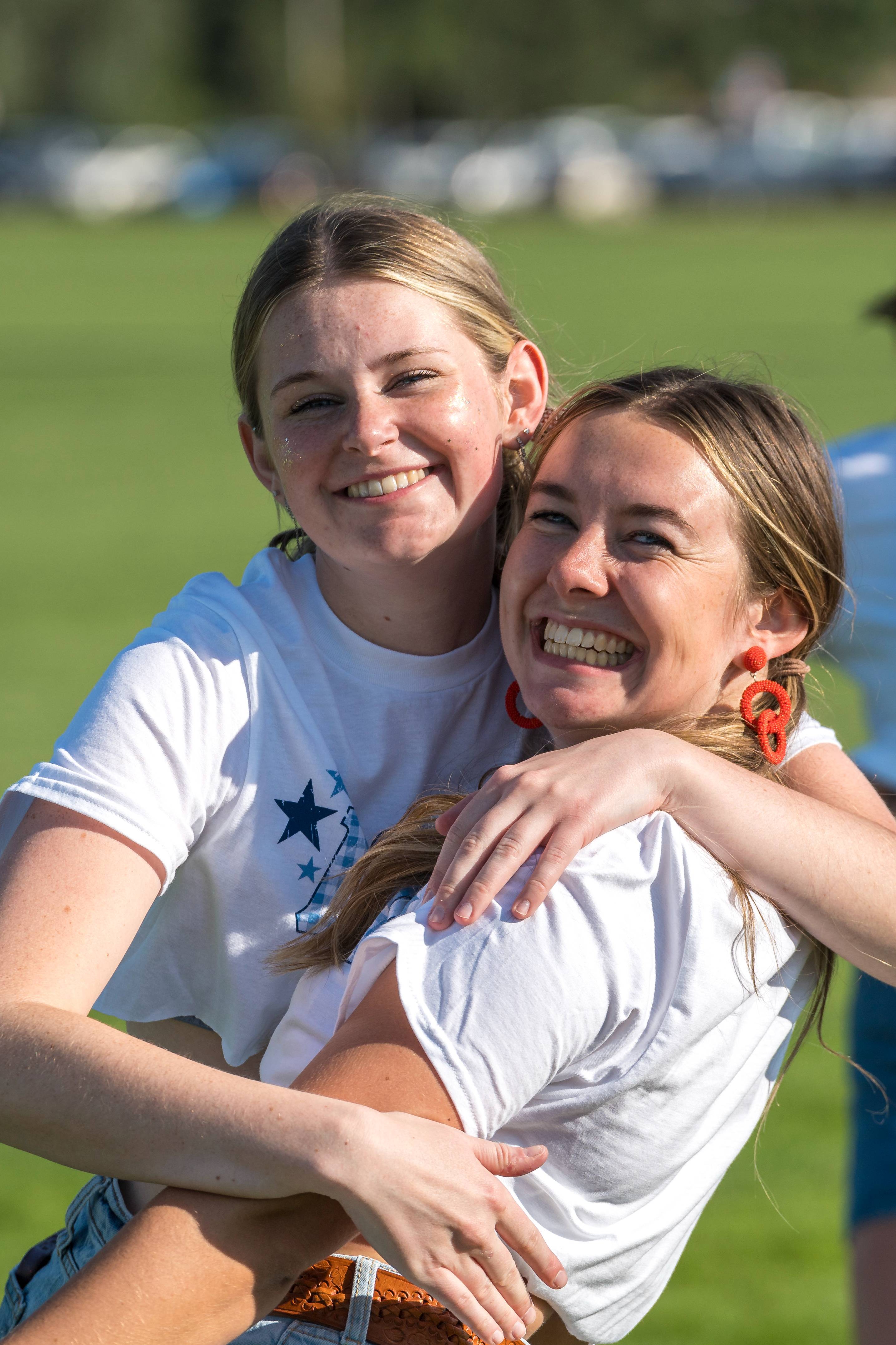 Sorority women hugging