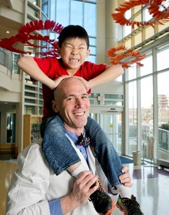 Son on shoulders