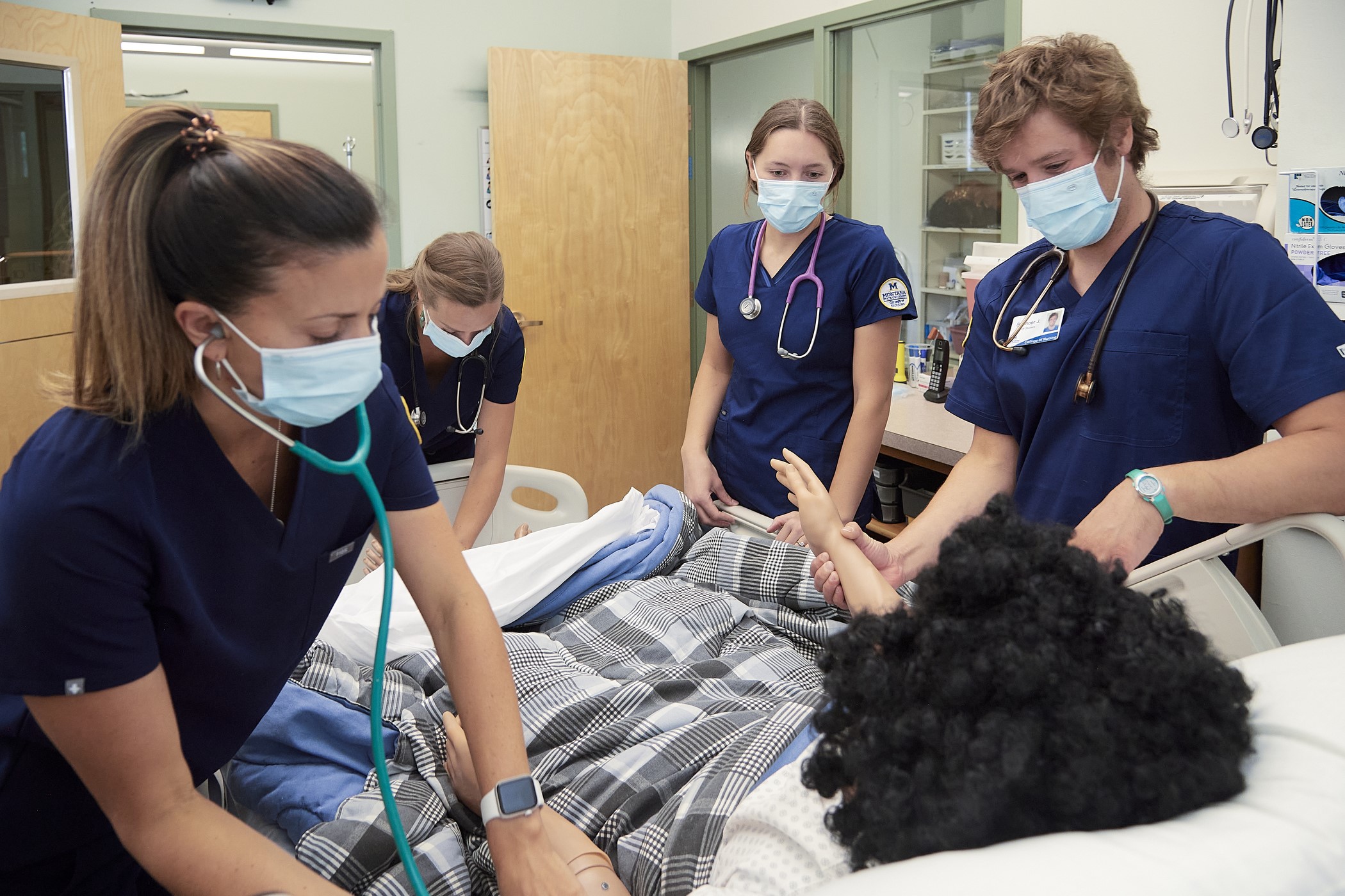 nursing students with patient