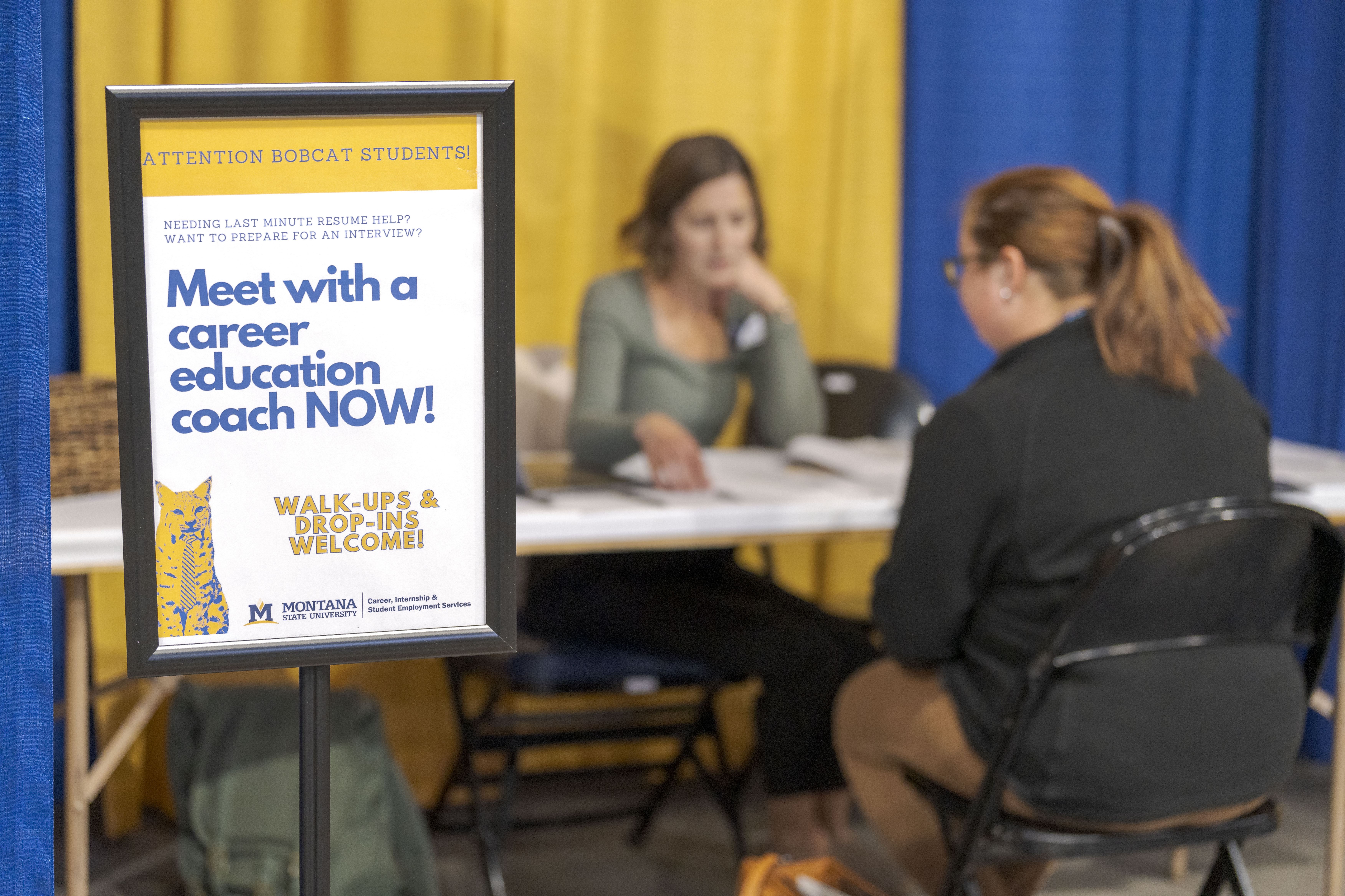 student meeting a career coach
